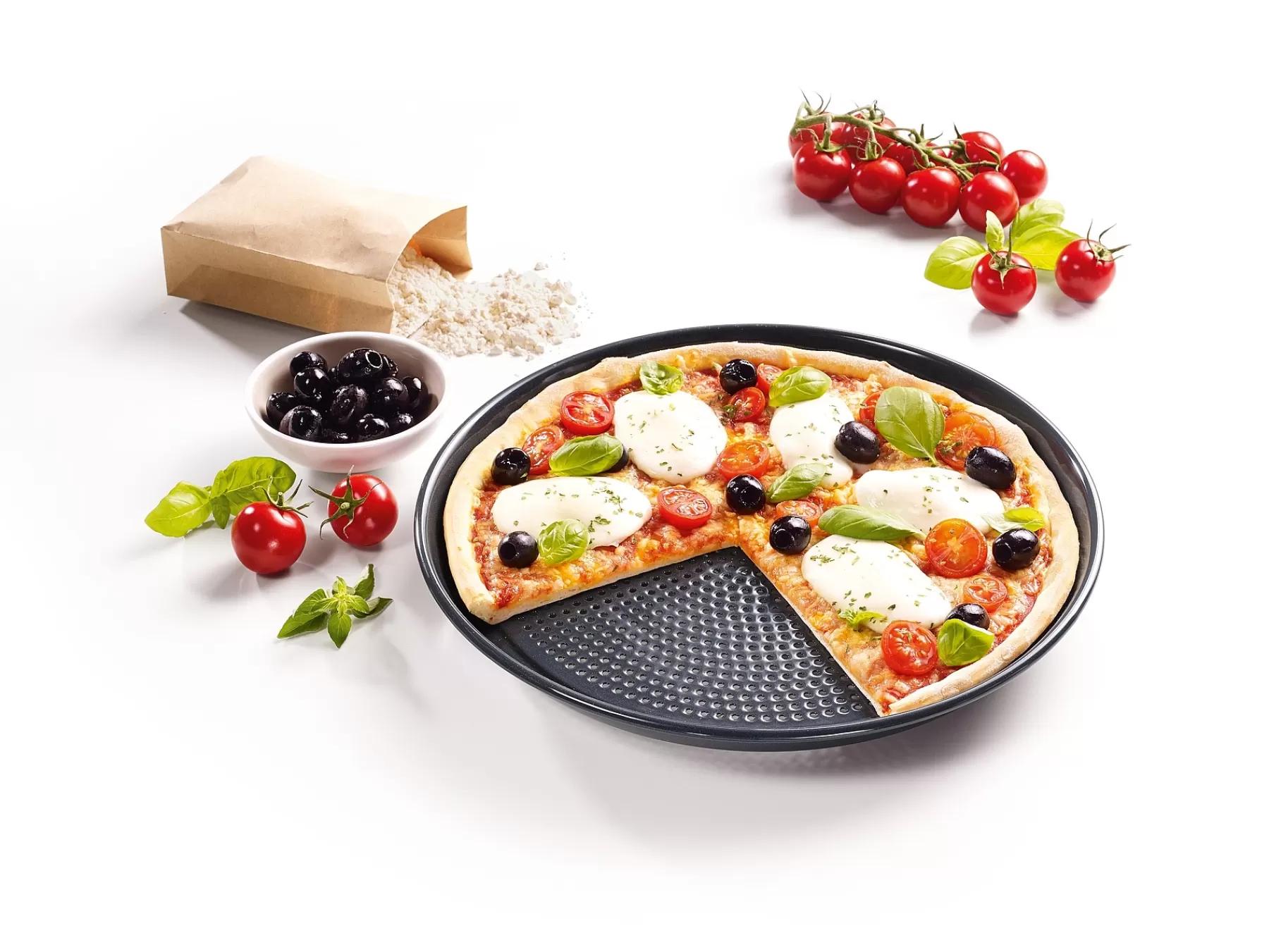 round_baking_and_airfry_tin_perforated_0.webp Miele Kitchen Accessories<Round Baking And Airfry Tin, Perforated